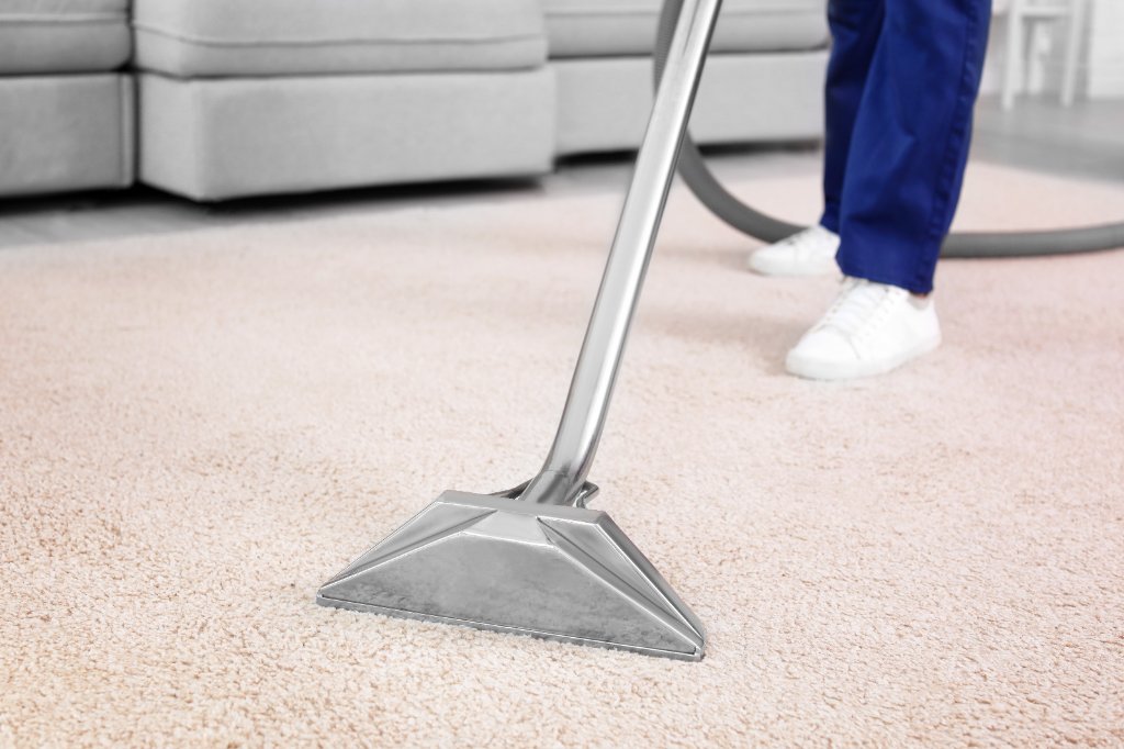 Hot water extraction deep cleaning carpet fibers