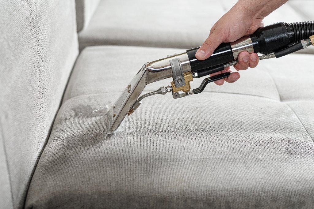 Upholstery cleaning with fabric identification